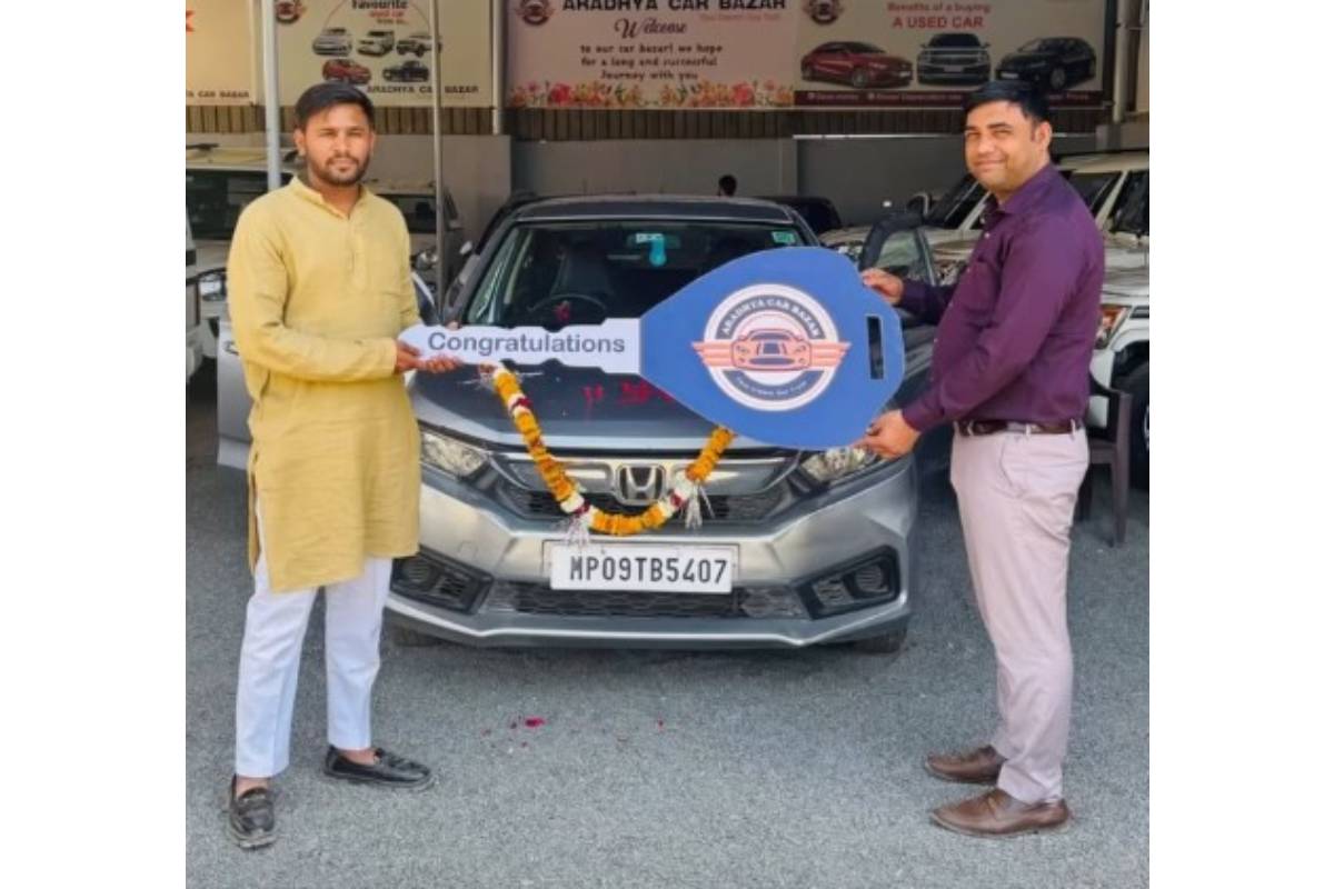 Happy customer receiving vehicle